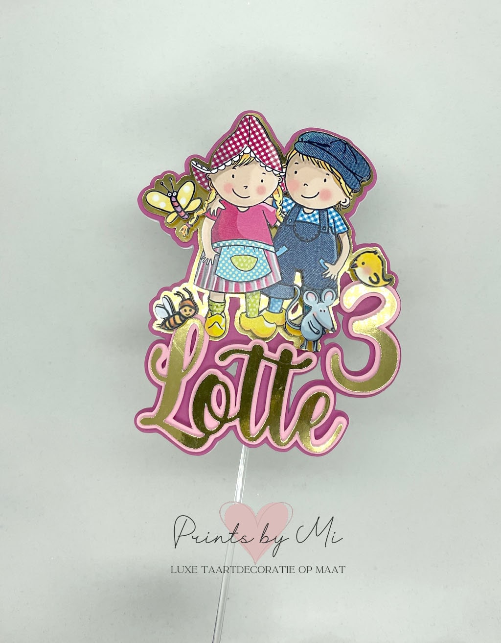 Taarttopper Fien en Teun met naam en cijfer